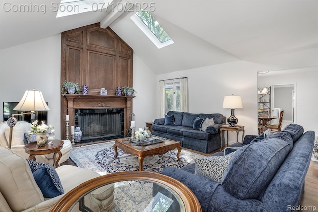 3445 Medford Dr, Troy, MI 48084 - living area featuring a skylight, wood finished floors, and a large fireplace