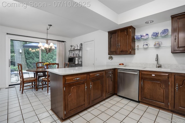3445 Medford Dr, Troy, MI 48084 - kitchen featuring stainless steel dishwasher, light countertops, a peninsula, a chandelier, and light tile patterned floors