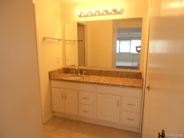 5086 Falmouth Dr, Troy, MI 48085 - bathroom with vanity and tile patterned flooring