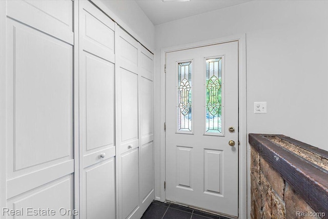 16917 Cicotte Ave, Allen Park, MI 48101 - doorway to outside featuring dark tile patterned floors