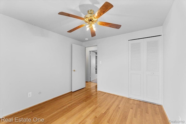 16917 Cicotte Ave, Allen Park, MI 48101 - unfurnished bedroom featuring light wood-style flooring, a closet, and a ceiling fan