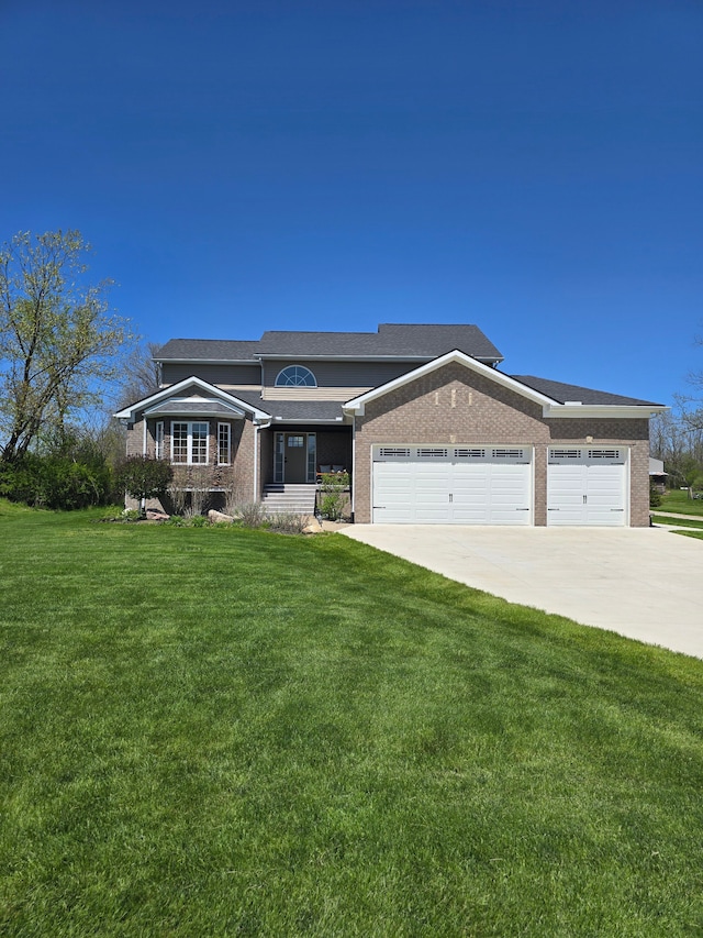 20223 32 Mile Rd, Armada, MI 48005 - view of front facade with an attached garage, driveway, a front lawn, and brick siding