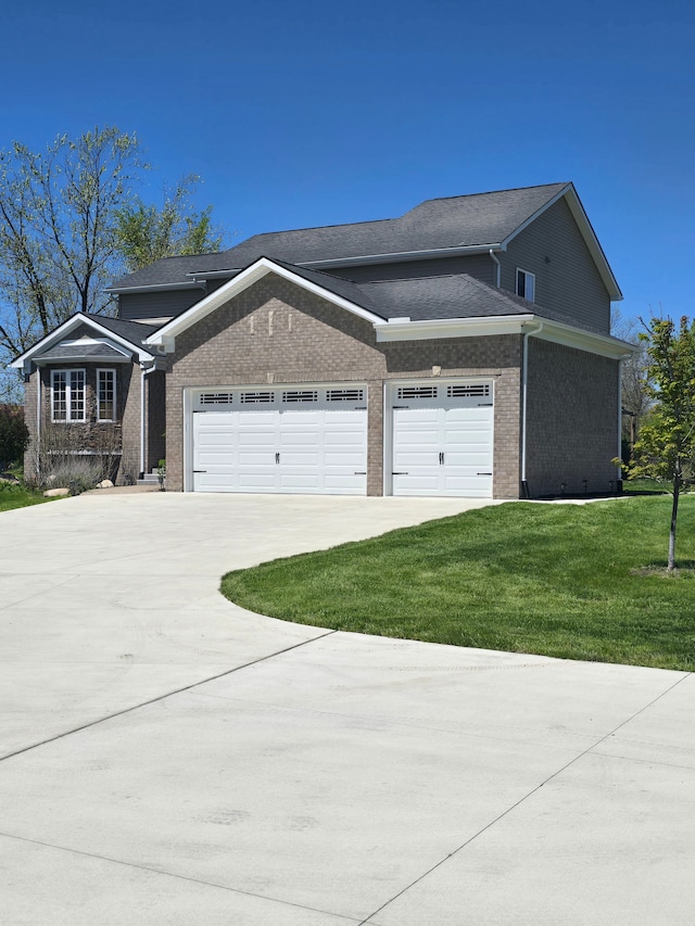 20223 32 Mile Rd, Armada, MI 48005 - view of front facade with driveway, an attached garage, brick siding, and a front yard