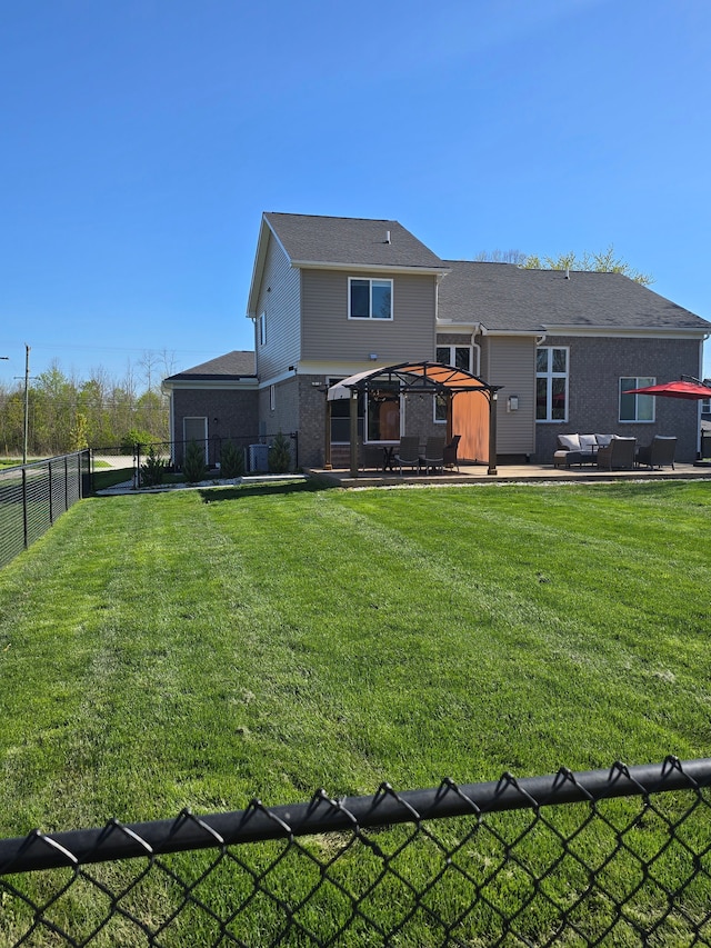 20223 32 Mile Rd, Armada, MI 48005 - back of house featuring a patio area, a gazebo, brick siding, and an outdoor living space