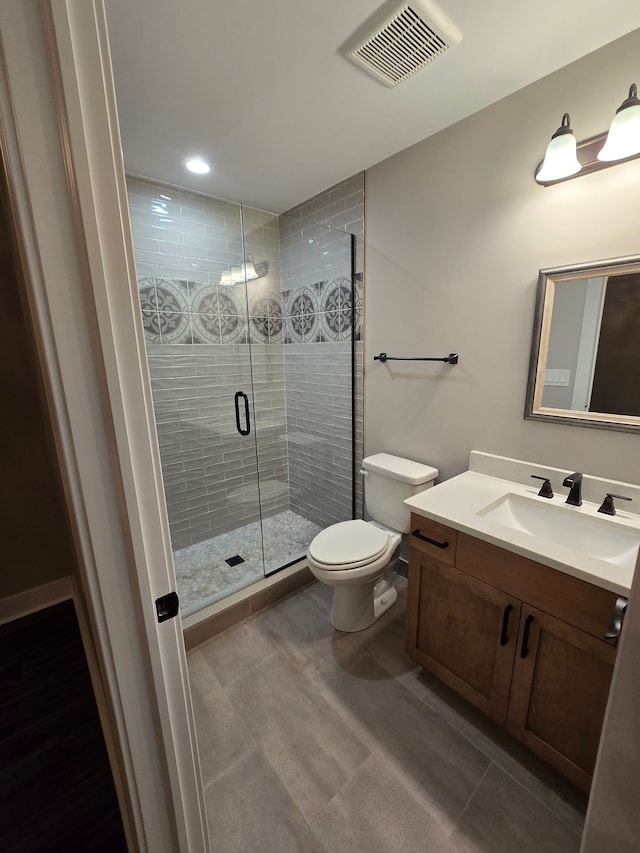 20223 32 Mile Rd, Armada, MI 48005 - full bathroom featuring a shower stall, vanity, toilet, and recessed lighting