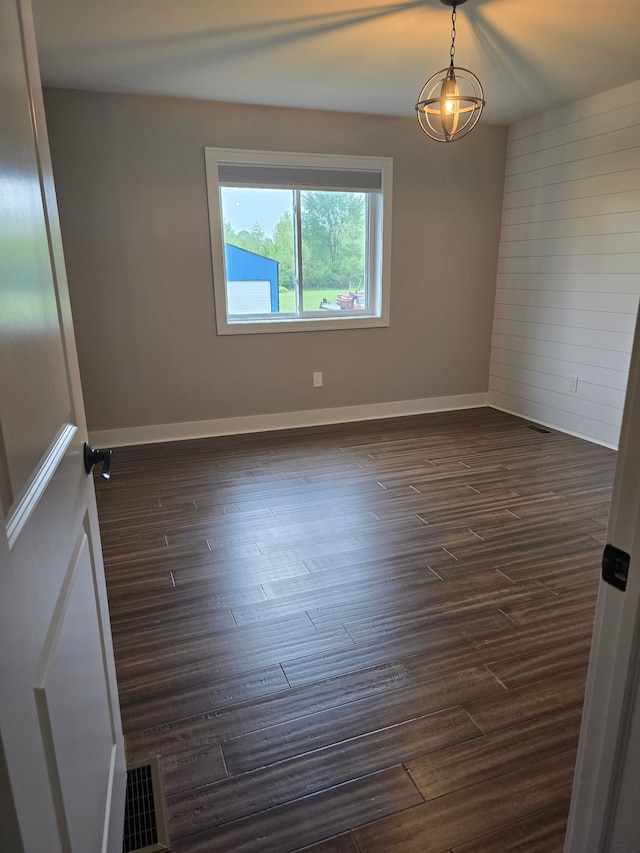 20223 32 Mile Rd, Armada, MI 48005 - empty room with dark wood-style floors and baseboards