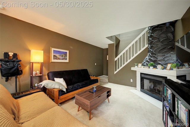 41381 Northwind Dr, Canton, MI 48188 - carpeted living room featuring stairs and a fireplace with flush hearth