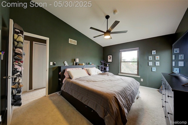 41381 Northwind Dr, Canton, MI 48188 - bedroom with light colored carpet, vaulted ceiling, and a ceiling fan