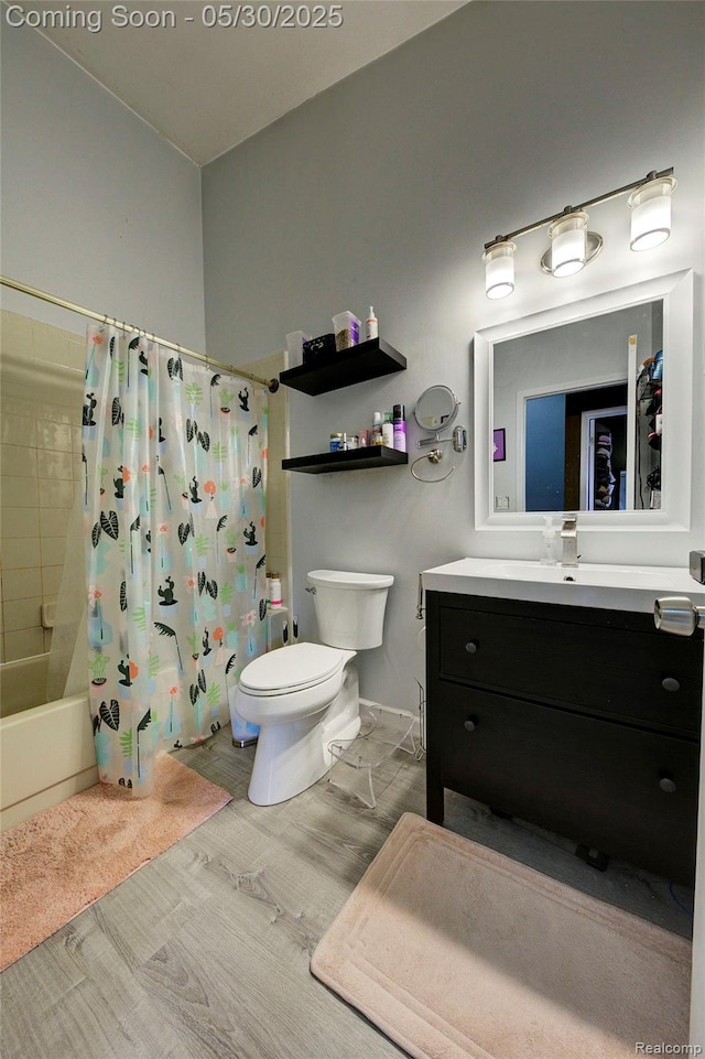 41381 Northwind Dr, Canton, MI 48188 - full bathroom featuring toilet, shower / bath combo with shower curtain, and vanity