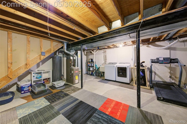 41381 Northwind Dr, Canton, MI 48188 - unfinished below grade area featuring washer and dryer, heating unit, water heater, and a sink