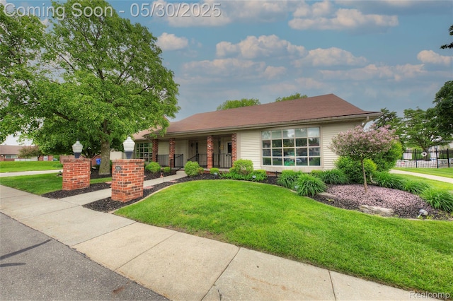 41381 Northwind Dr, Canton, MI 48188 - view of front of home with a porch