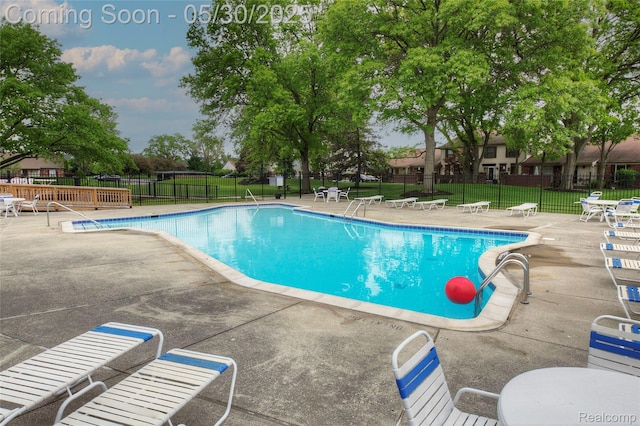 41381 Northwind Dr, Canton, MI 48188 - community pool with a patio area