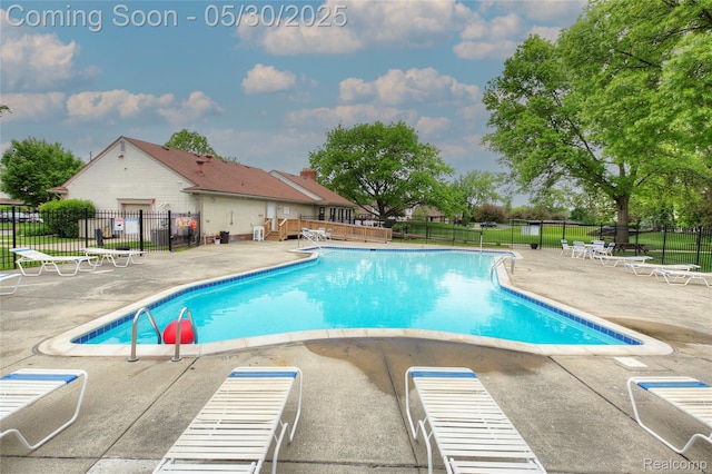 41381 Northwind Dr, Canton, MI 48188 - community pool featuring a patio area