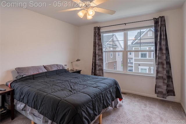 3217 Chambers W Unit 87, Wixom, MI 48393 - carpeted bedroom with baseboards and ceiling fan