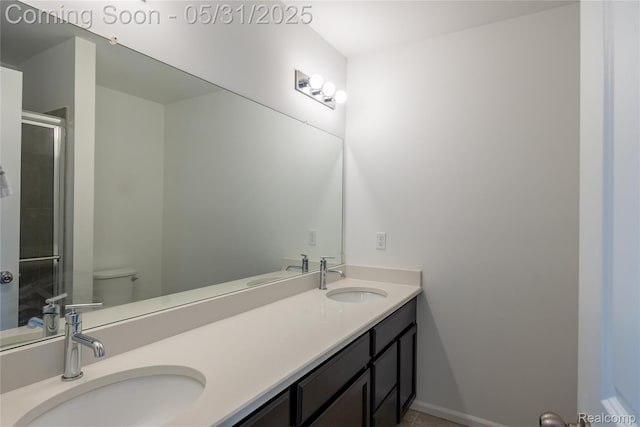3217 Chambers W Unit 87, Wixom, MI 48393 - full bathroom featuring double vanity, a shower with door, toilet, and tile patterned flooring