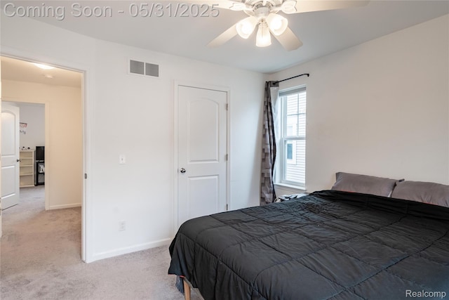 3217 Chambers W Unit 87, Wixom, MI 48393 - bedroom featuring light colored carpet, baseboards, and a ceiling fan