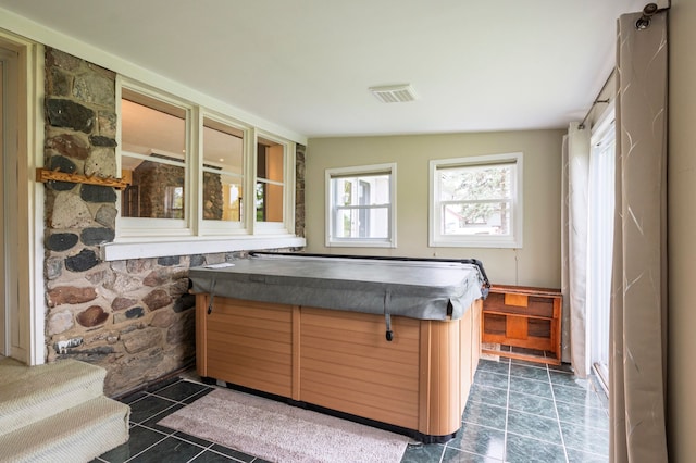 775 Sexton Rd, Howell, MI 48843 - sunroom featuring a hot tub