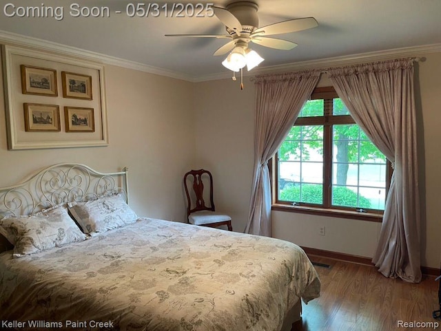 8241 Fountain View Dr, Flushing, MI 48433 - bedroom with wood finished floors, baseboards, ornamental molding, and ceiling fan