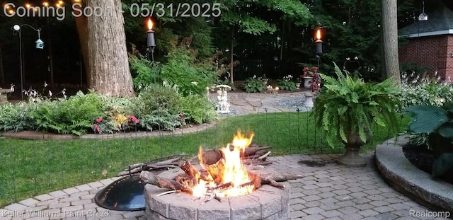 8241 Fountain View Dr, Flushing, MI 48433 - view of yard with an outdoor fire pit and a patio