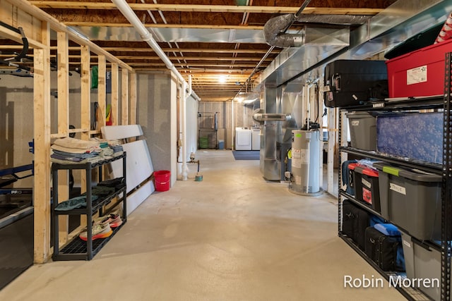 11648 Everette Ave, Allendale, MI 49401 - unfinished below grade area with gas water heater and independent washer and dryer