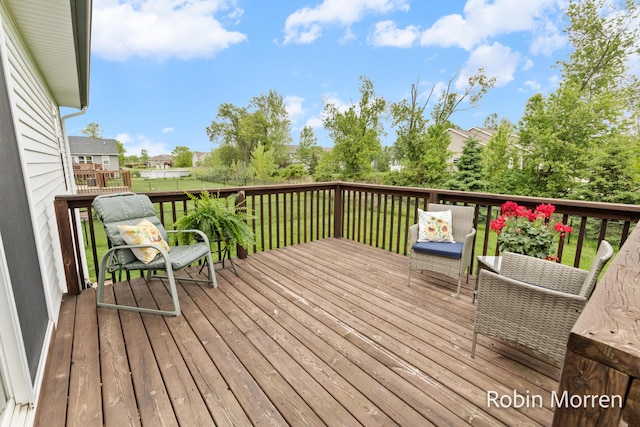11648 Everette Ave, Allendale, MI 49401 - deck featuring a lawn