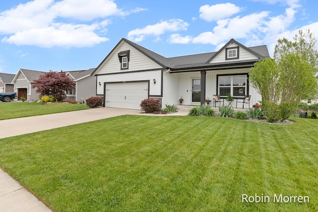11648 Everette Ave, Allendale, MI 49401 - view of front of property featuring concrete driveway, a front yard, a porch, and a garage