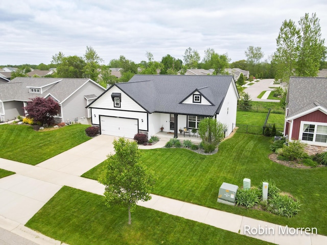 11648 Everette Ave, Allendale, MI 49401 - modern inspired farmhouse with driveway, a garage, a residential view, and covered porch