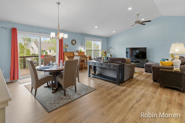 11648 Everette Ave, Allendale, MI 49401 - dining area featuring light wood-style floors, lofted ceiling, ceiling fan, a chandelier, and recessed lighting