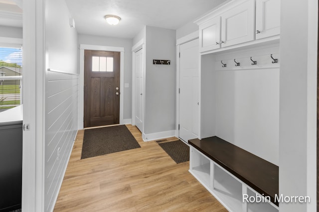11648 Everette Ave, Allendale, MI 49401 - mudroom featuring light wood-style floors and baseboards