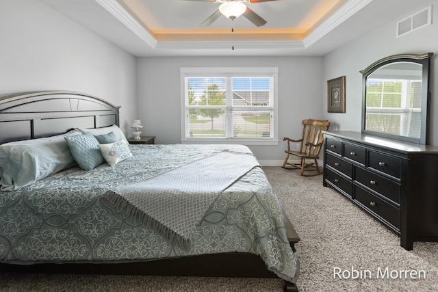 11648 Everette Ave, Allendale, MI 49401 - bedroom featuring light colored carpet, a raised ceiling, multiple windows, crown molding, and ceiling fan
