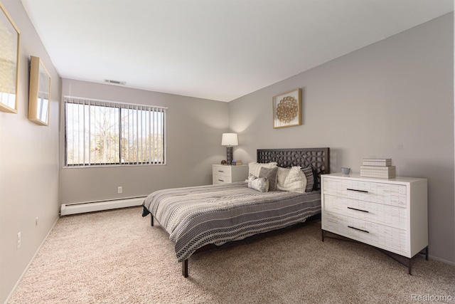 930 Village Green Ln, Waterford, MI 48328 - bedroom with baseboard heating, carpet floors, and baseboards