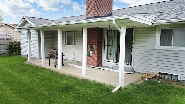 3215 Mackin Rd, Flint, MI 48504 - back of property featuring roof with shingles and a chimney