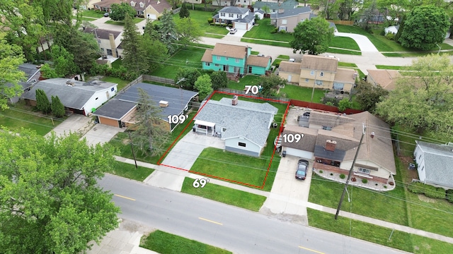 3215 Mackin Rd, Flint, MI 48504 - aerial perspective of suburban area featuring property parcel outlined