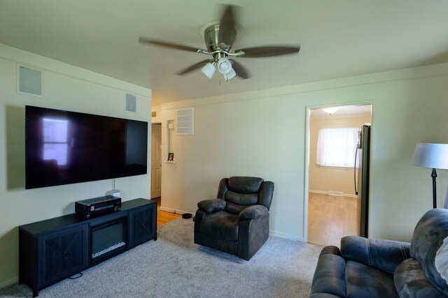 24690 Annapolis St, Dearborn Heights, MI 48125 - living area with a ceiling fan, baseboards, and light colored carpet