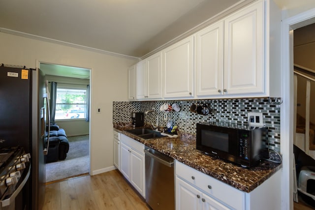 24690 Annapolis St, Dearborn Heights, MI 48125 - kitchen featuring stainless steel appliances, a sink, light wood finished floors, white cabinets, and crown molding