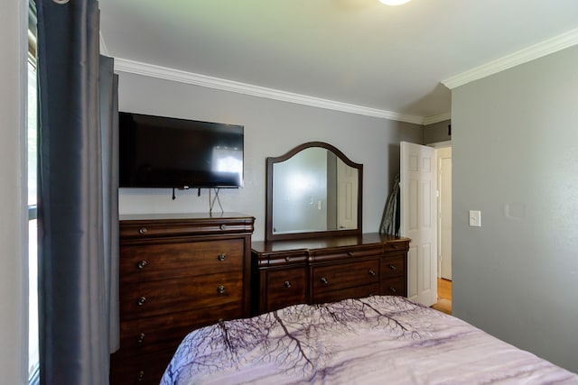 24690 Annapolis St, Dearborn Heights, MI 48125 - bedroom featuring ornamental molding and wood finished floors