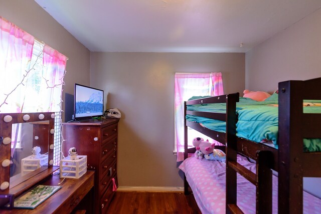 24690 Annapolis St, Dearborn Heights, MI 48125 - bedroom with dark wood-style floors and baseboards