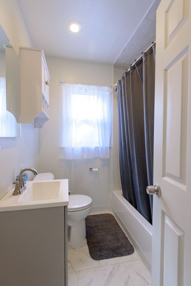 24690 Annapolis St, Dearborn Heights, MI 48125 - bathroom featuring vanity, toilet, marble look tiles, shower / tub combo, and recessed lighting