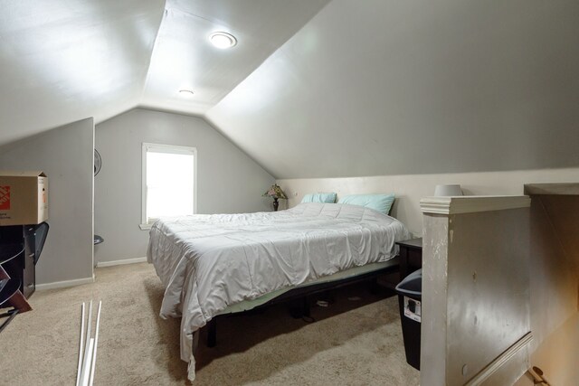 24690 Annapolis St, Dearborn Heights, MI 48125 - bedroom featuring vaulted ceiling, carpet floors, and baseboards