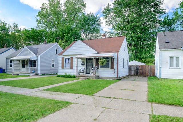 24690 Annapolis St, Dearborn Heights, MI 48125 - bungalow with driveway and covered porch