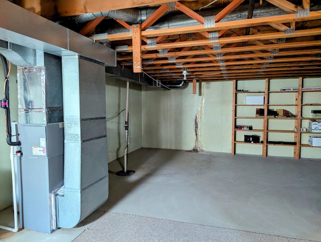 19 Old Mill Dr Unit 12, Holland, MI 49423 - unfinished basement with heating unit