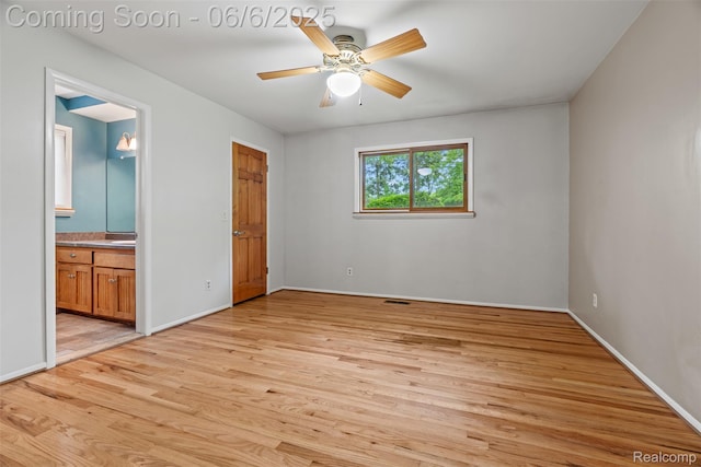 36963 Heatherton Dr, Farmington, MI 48335 - unfurnished bedroom featuring light wood finished floors, baseboards, connected bathroom, and a ceiling fan