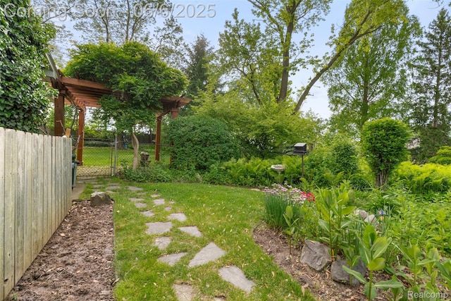 36963 Heatherton Dr, Farmington, MI 48335 - view of yard with a gate