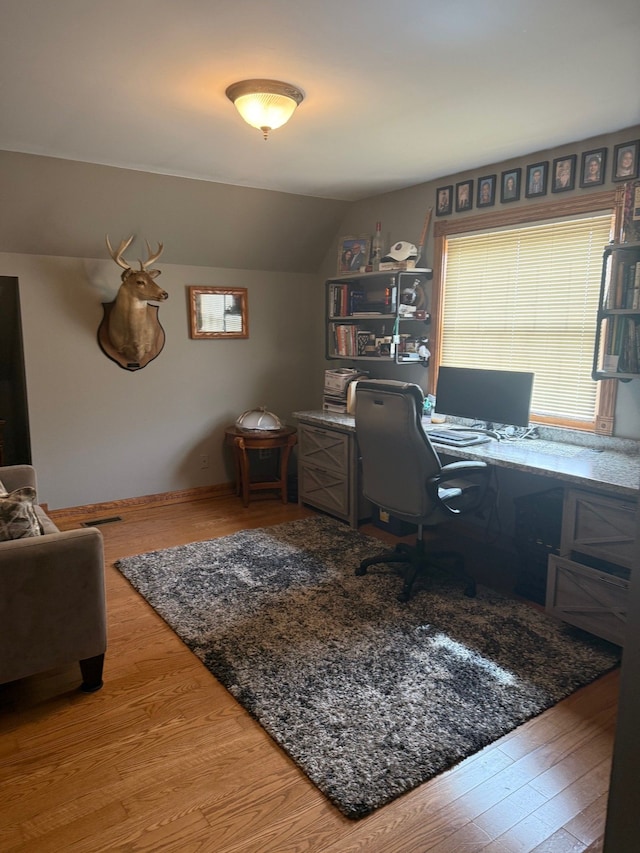 6523 Jones Rd, North Branch, MI 48461 - office space with wood finished floors and lofted ceiling