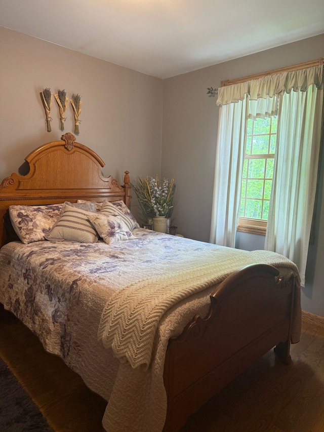 6523 Jones Rd, North Branch, MI 48461 - bedroom featuring wood finished floors