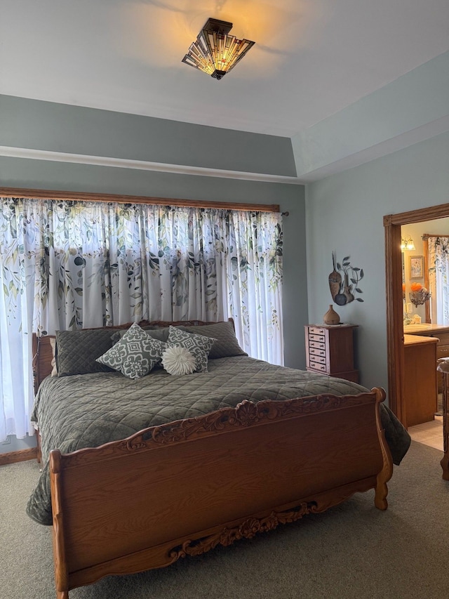 6523 Jones Rd, North Branch, MI 48461 - carpeted bedroom featuring ensuite bathroom