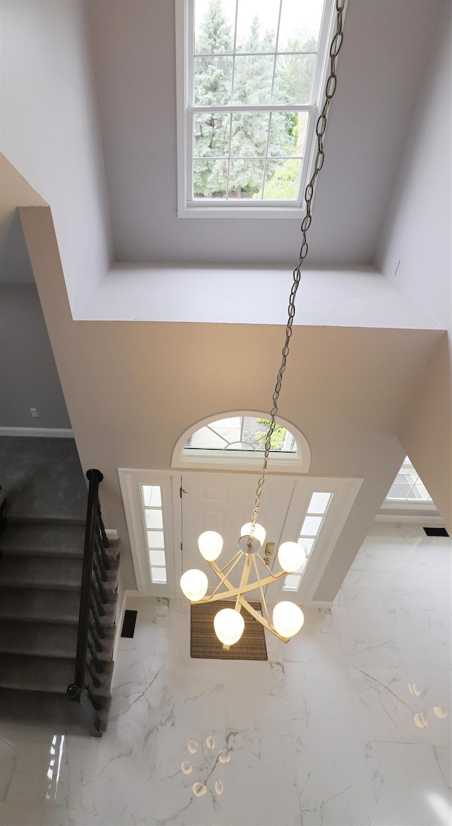 4116 Split Rail Dr, Fenton, MI 48430 - detailed view of a chandelier and baseboards