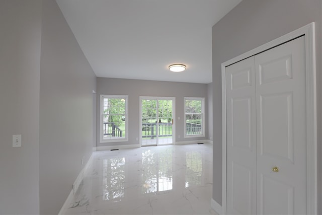 4116 Split Rail Dr, Fenton, MI 48430 - hall with marble tiled floors and baseboards