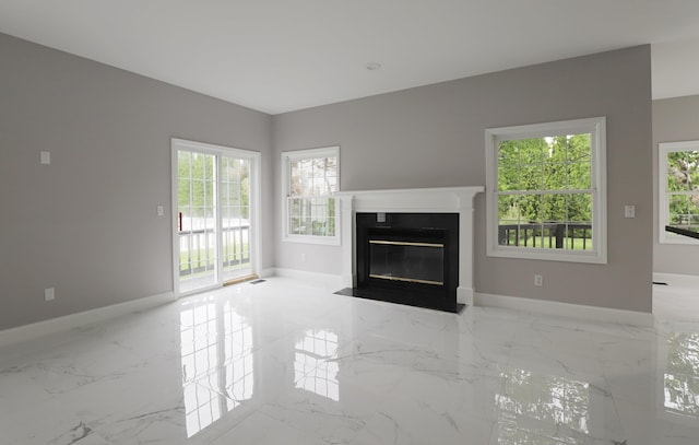 4116 Split Rail Dr, Fenton, MI 48430 - unfurnished living room featuring marble finish floors, baseboards, and a fireplace with flush hearth