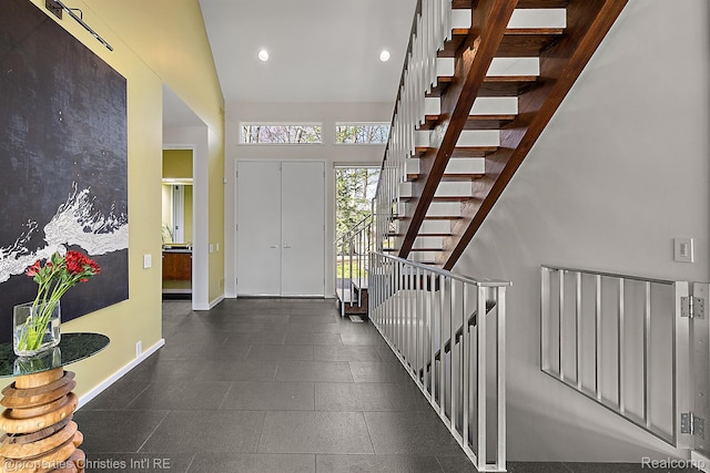 7371 Lindenmere Dr, Bloomfield Hills, MI 48301 - entryway featuring baseboards, recessed lighting, and a towering ceiling